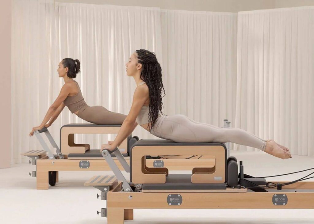 Reformer Pilates Training Guide | Beginner Benefits & Machine Basics